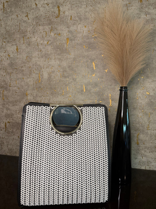 Salvatore Ferragamo “Vela Handle”